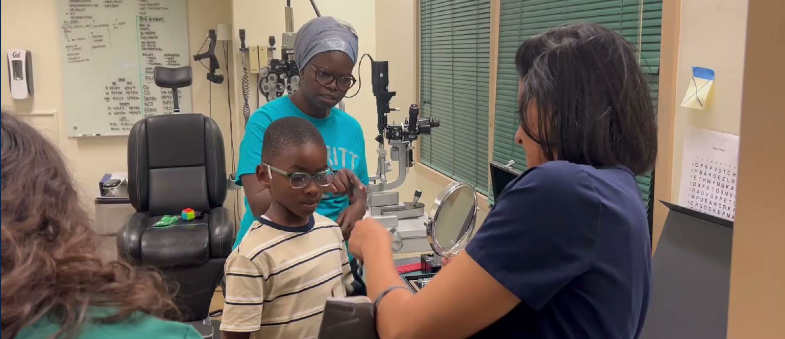 A child being examined by a medical professional.