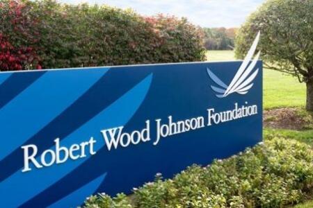 A sign with the Robert Wood Johnson Foundation logo