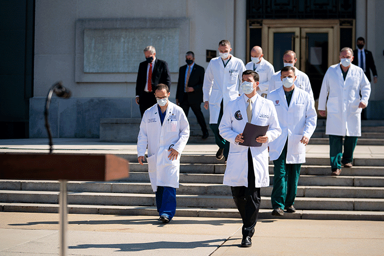 Doctors walking in lab coats