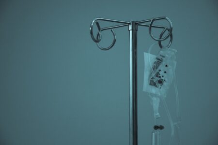 An IV bag hanging from a pole